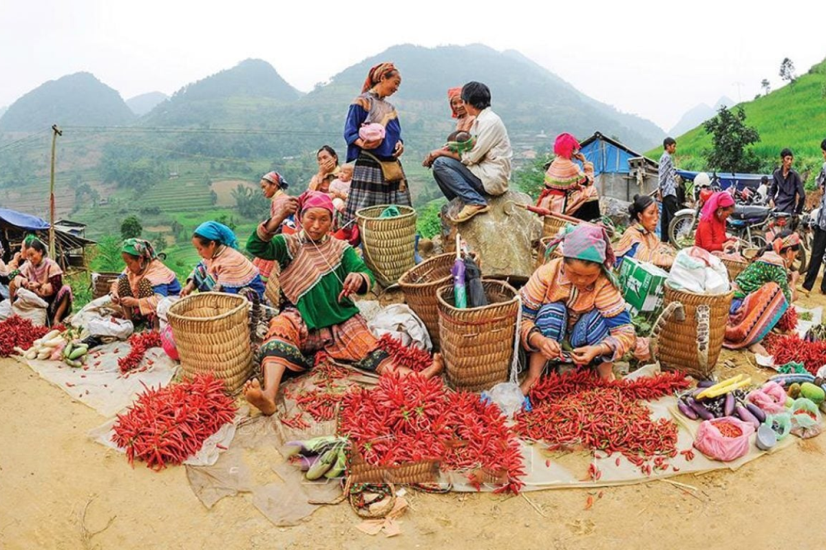 Ethnic women in colorful costumes at Ta Sin Thang fair market in Dien Bien